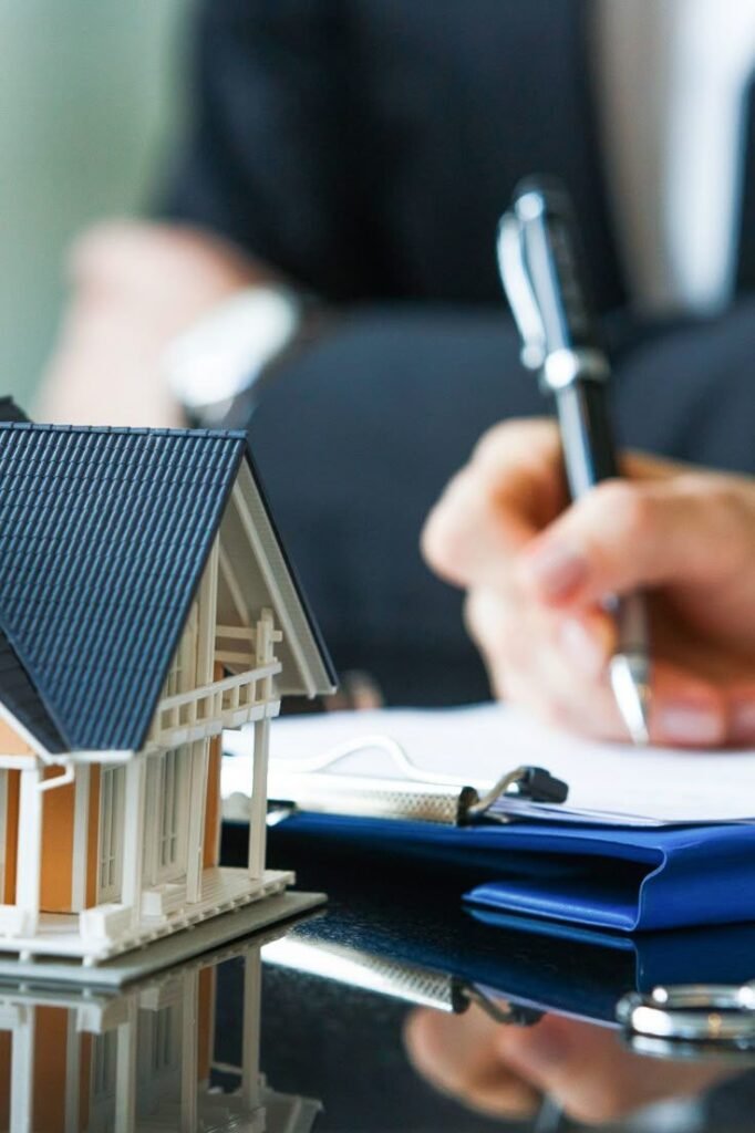 Buyer discussing a house purchase with an estate agent